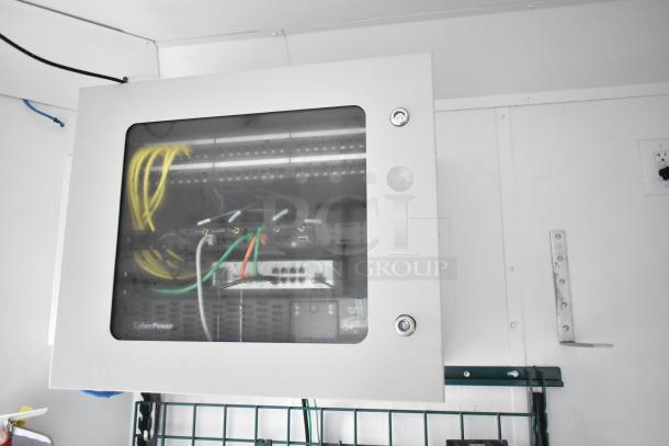 2020 SDG food trailer interior with Martin IT/Network Cabinet, visible wiring, and clear display.