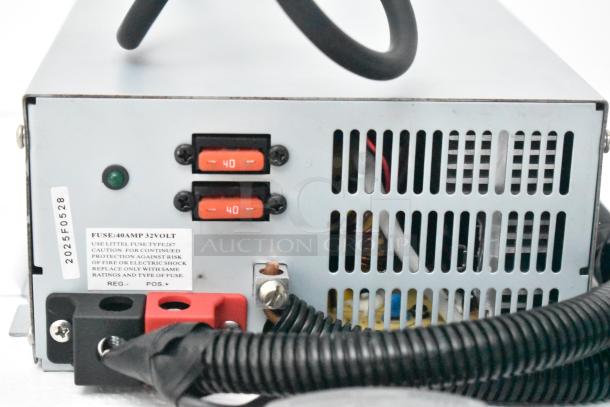Rear view of 2020 SDG food trailer's electrical system. Features 40 AMP fuses, vented panel, with wiring and labels.