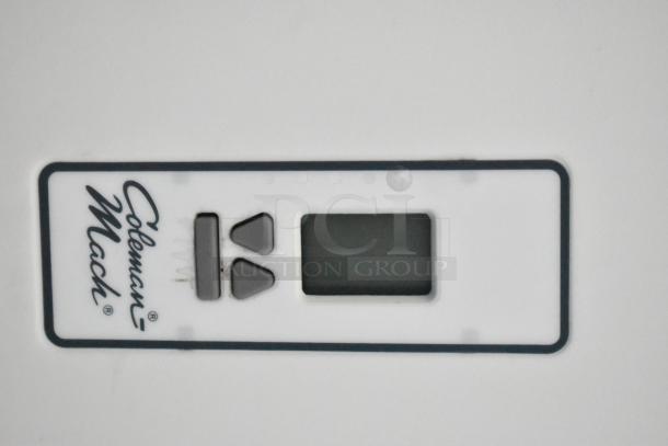 Coleman Mach thermostat panel, featuring control buttons and display, installed inside SDG food trailer shell.