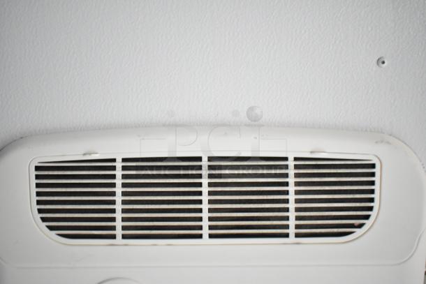 Interior ceiling vent of 2020 SDG food trailer shell, white, in clean condition. Ready for customization and equipment.