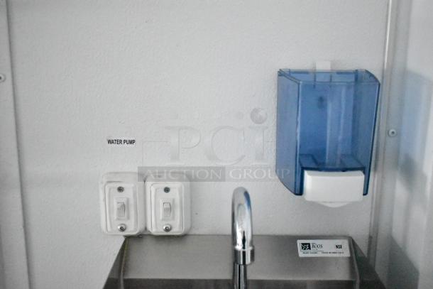 2020 SDG 8.5' x 20' food trailer; stainless sink, blue soap dispenser, water pump switches, ready to equip, clear title.