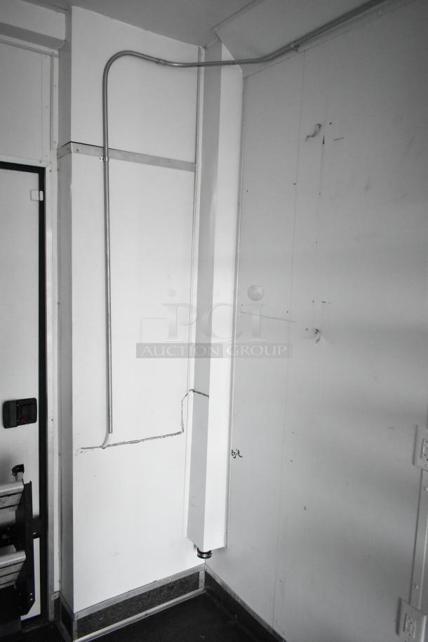 2020 SDG 8.5' x 20' food trailer shell interior showing empty wall ready for customization. Clear title included.