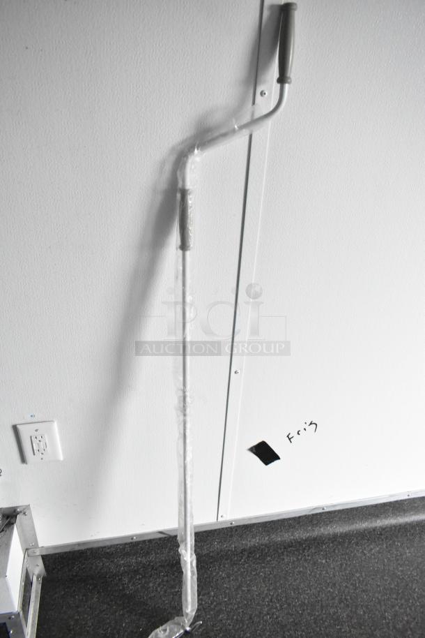 Interior view of a 2020 SDG 8.5' x 20' food trailer shell, featuring wall outlets and floor markings.