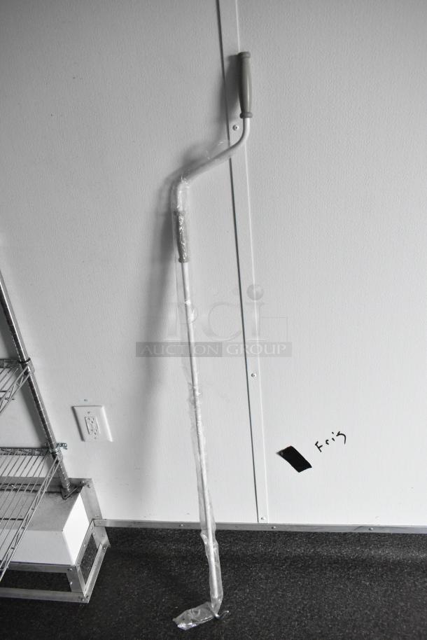 2020 SDG 8.5' x 20' food trailer shell with wire shelving, plastic-wrapped sink attachment, and network cabinet, ready to equip.