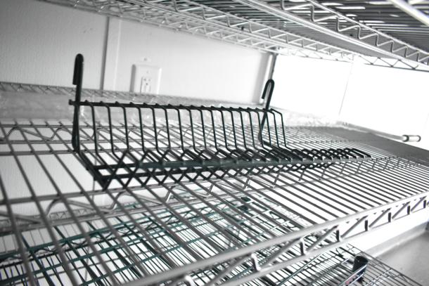 2020 SDG 8.5' x 20' food trailer shell with wire shelving units, ready for customization. Clear title included.