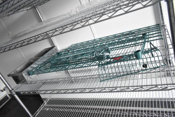 2020 SDG 8.5' x 20' food trailer shell interior. Includes wire shelving units and Martin IT/Network cabinet. Ready to equip.