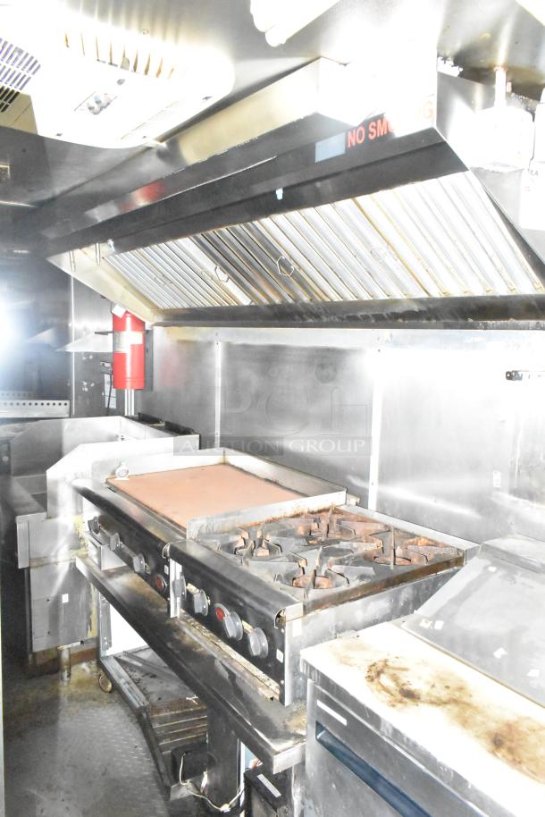 2019 Cruising Kitchens 8.5' x 24' trailer interior featuring CaptiveAire grease hood, fire suppression, Arctic Air equipment.