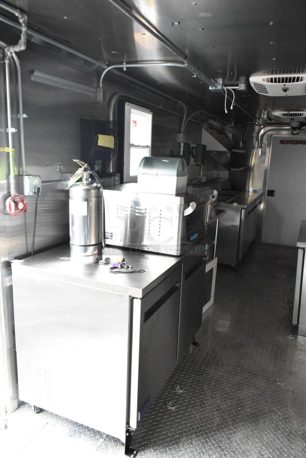 2020 ATX Covered Wagon 8.5' x 24' mobile kitchen trailer interior with TurboChef oven, Arctic Air refrigeration, CaptiveAire hood.