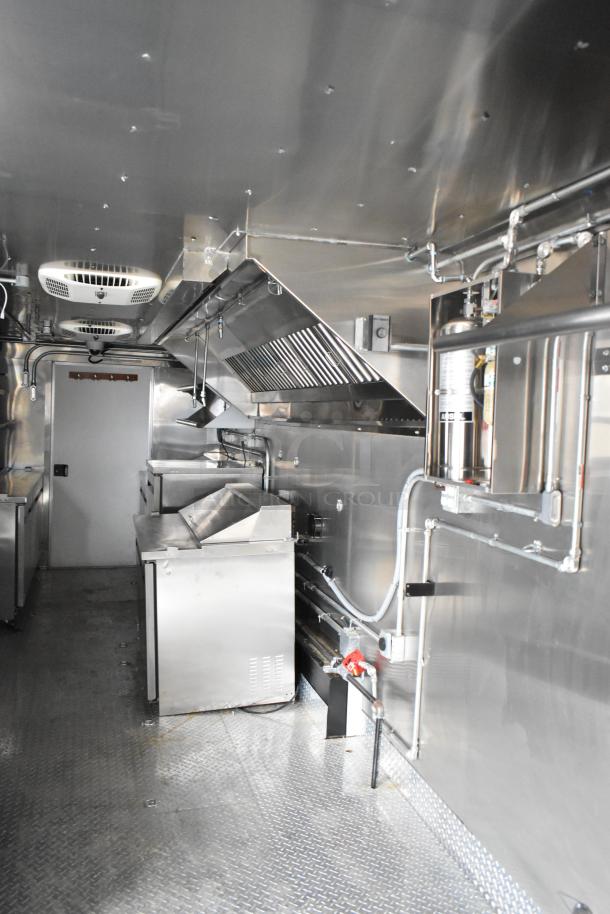 2020 ATX/Covered Wagon 8.5' x 24' mobile kitchen trailer interior with TurboChef oven, CaptiveAire hood, Arctic Air refrigeration.