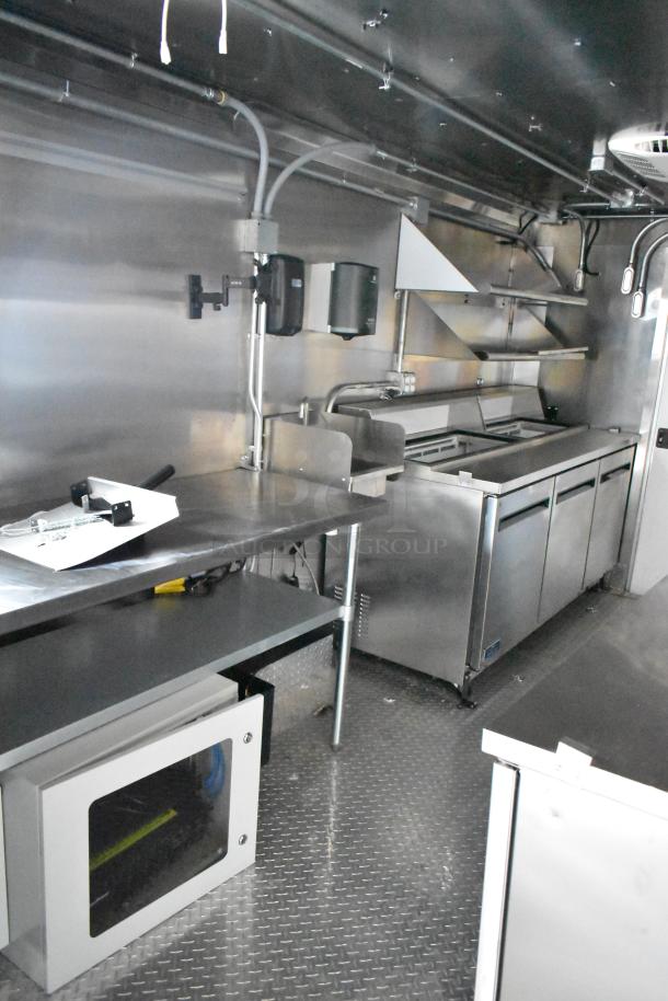 2020 ATX Covered Wagon 8.5'x24' mobile kitchen trailer interior with TurboChef, CaptiveAire hood, Arctic Air refrigeration, ROAM power.