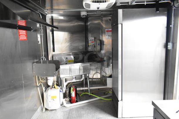 2020 ATX mobile kitchen trailer, stainless steel interior, Arctic Air refrigeration, plumbing, fire suppression system.