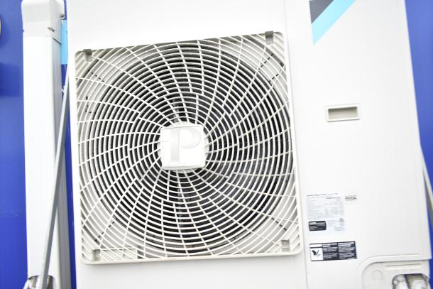 Close-up of the CaptiveAire hood in the Burger King mobile kitchen trailer. Visible serial and specification labels.