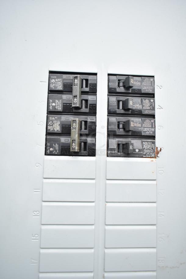 Electrical panel inside a mobile kitchen trailer, showing labeled Circuit Breakers: Siemens with Amperage 40 and 20.