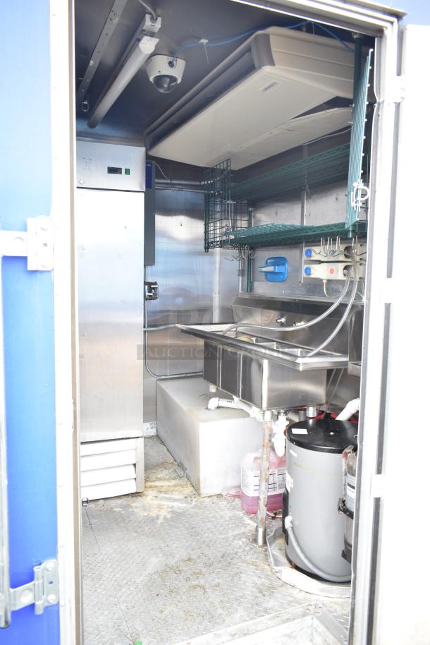 Fully outfitted mobile kitchen trailer, featuring CaptiveAire hood, Pitco fryers, Arctic Air prep tables, and full POS system.