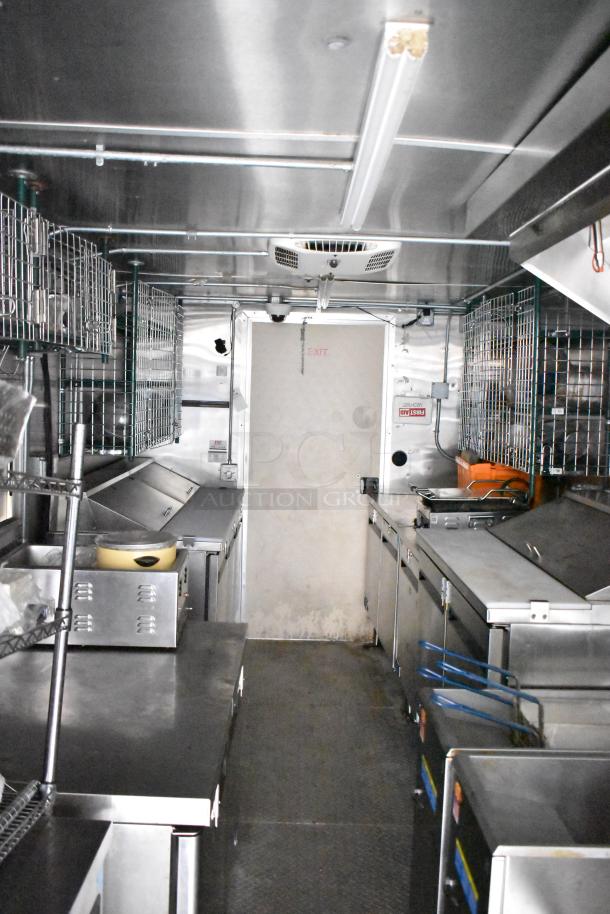 Fully equipped mobile kitchen trailer with CaptiveAire hood, Pitco fryers, Arctic Air prep tables, and full POS system. Excellent condition.