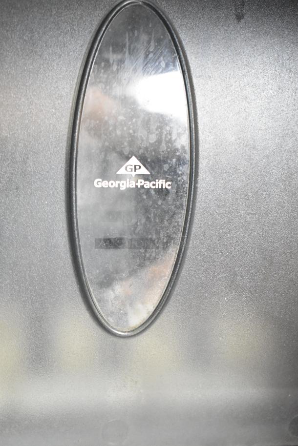 Georgia-Pacific label on the surface of a mobile kitchen trailer. Features CaptiveAire hood, Pitco fryers, and Arctic Air coolers.