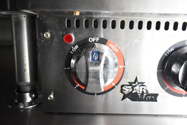 Star Max stainless control panel with knobs for low, off, and high settings, featuring red indicator light.