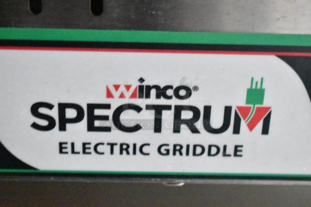 Close-up of Winco Spectrum Electric Griddle label, part of the mobile kitchen trailer setup.