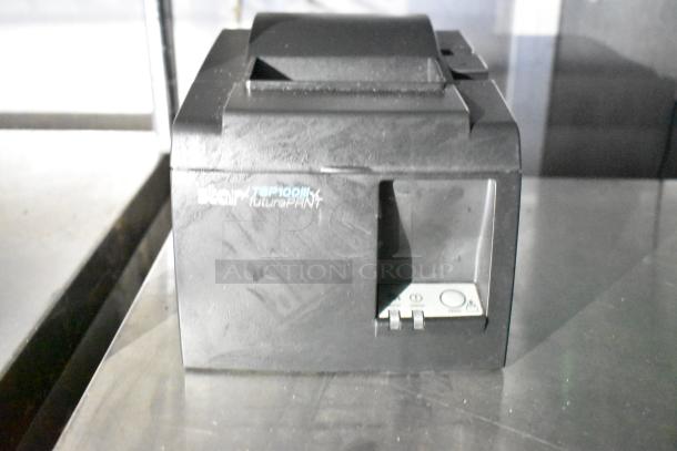 Star TSP100III printer in mobile kitchen trailer, features futurePRNT technology, shown as part of POS setup.