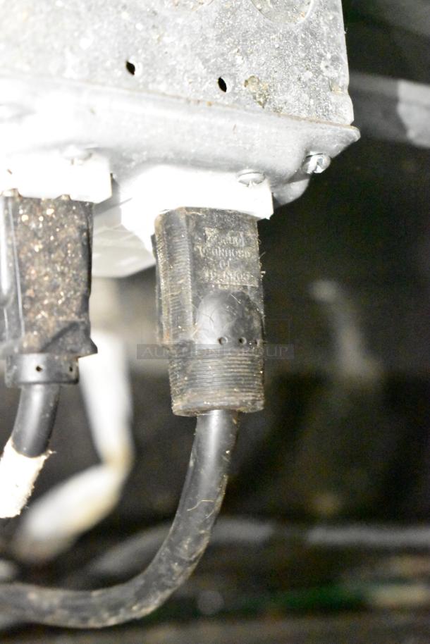 Power connection for mobile kitchen trailer, showing wiring setup.