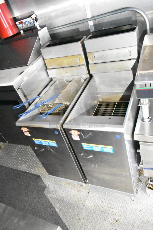 Mobile kitchen trailer interior with Pitco fryers. Features CaptiveAire hood and full POS setup. Good condition.