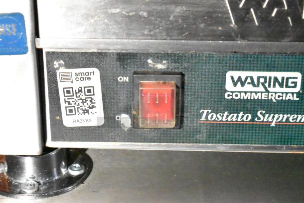 Mobile kitchen equipment featuring a Waring Commercial Tostato Supremo switch, Smart Care QR code, and NSF marking.