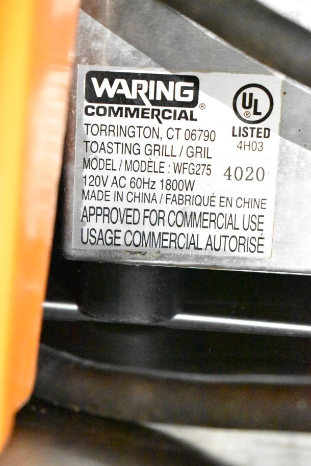 Label on Waring Commercial toasting grill model WFG275, 120V, 60Hz, 1800W, approved for commercial use.