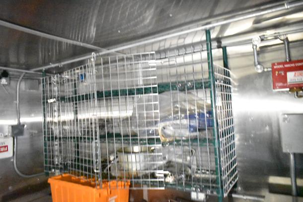 Mobile kitchen trailer with CaptiveAire hood, Pitco fryers, Arctic Air prep tables, air conditioning, and POS system.