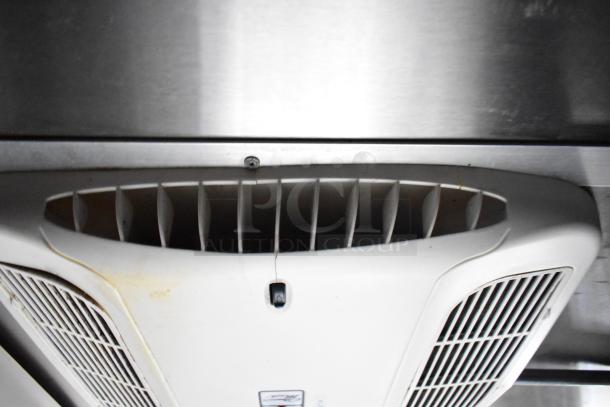 Mobile kitchen trailer with CaptiveAire hood system, showing vent detail. Equipped with Mushroom fans, Pitco fryers.