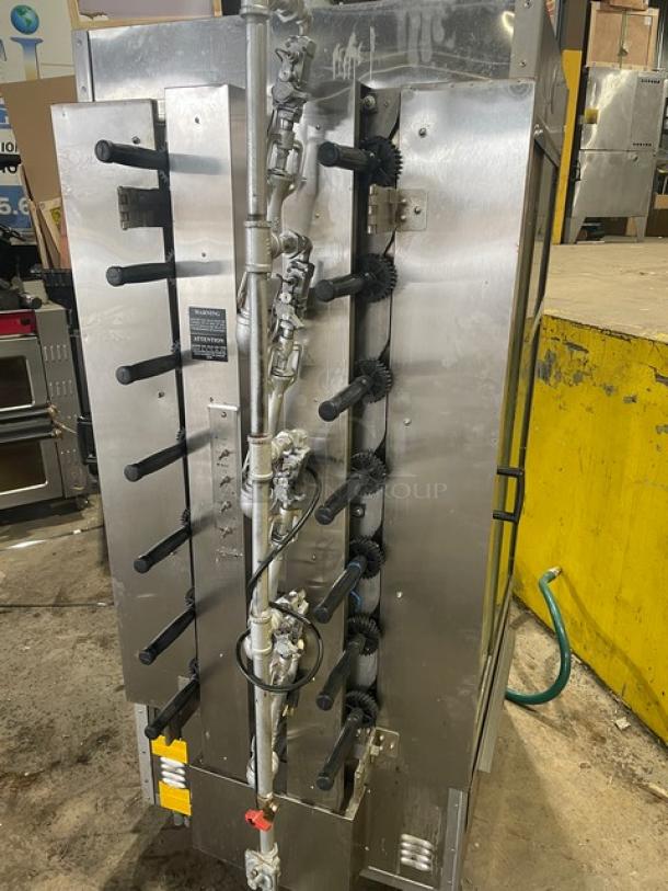 Old Hickory 2022 N14G commercial rotisserie oven, stainless steel, 14-spit, front/back sliding glass doors, on casters.