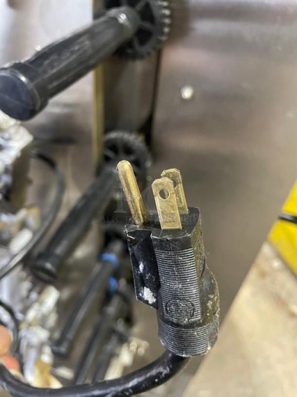 Old Hickory N14G stainless steel rotisserie oven, natural gas, 14-spit, glass doors, on casters, 120V plug shown.