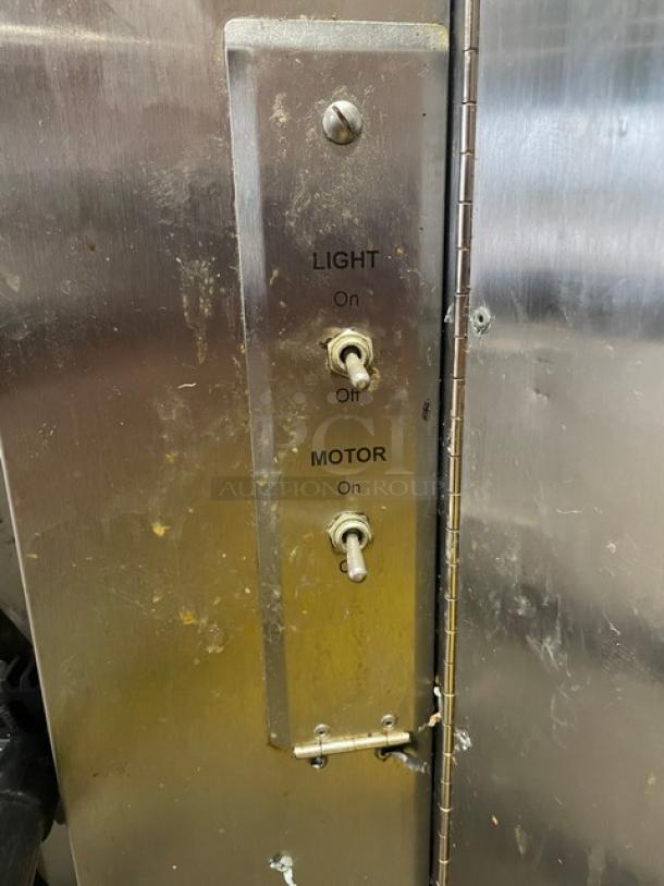 Old Hickory N7GRH stainless steel rotisserie oven control panel with light and motor switches, visible wear.