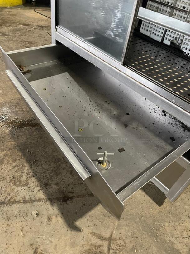 Old Hickory 2021 commercial stainless steel rotisserie oven drawer. Model N7GRH, visible wear, sliding glass door, on casters.