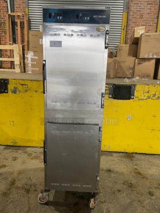 Alto-Shaam 1000-UP commercial stainless steel dual compartment mobile heated cabinet, 120V, on casters, model 1000UP.