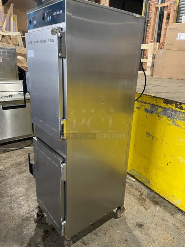 Alto-Shaam 1000-UP stainless steel dual compartment heated cabinet, model 1000UP, on casters, used condition.