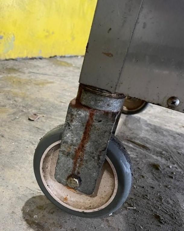Alto-Shaam 1000-UP dual compartment heated cabinet on casters, visible rust on wheel, stainless steel, electric 120V, used condition.