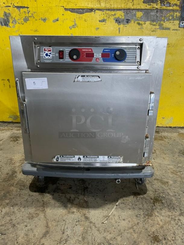 Metro C5 Series stainless steel undercounter heated cabinet, Model C593L-SFS-U, with casters and universal pan rack.