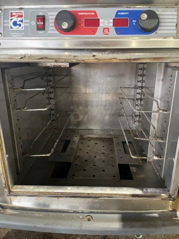 Metro C5 Series electric undercounter heated holding/proofing cabinet, model C593L-SFS-U, stainless steel, on casters, includes universal pan rack.