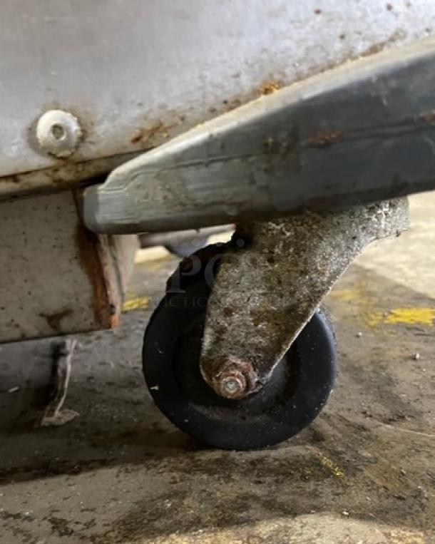 Metro C5 Series heated holding/proofing cabinet on caster. Model C593LSFSU, stainless steel, 2018, visible rust on wheel.