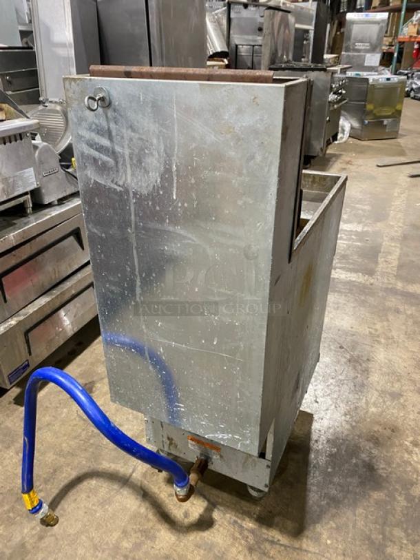 Pitco 45C-S commercial stainless steel natural gas fryer, 42 lb capacity, with backsplash and basket hanger, on casters.