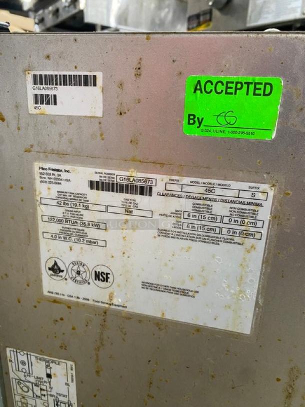 Pitco 45CS gas fryer, 42 lb. capacity, stainless steel, model 45C-S SN: G16LA085673, on casters, with labels showing energy info.