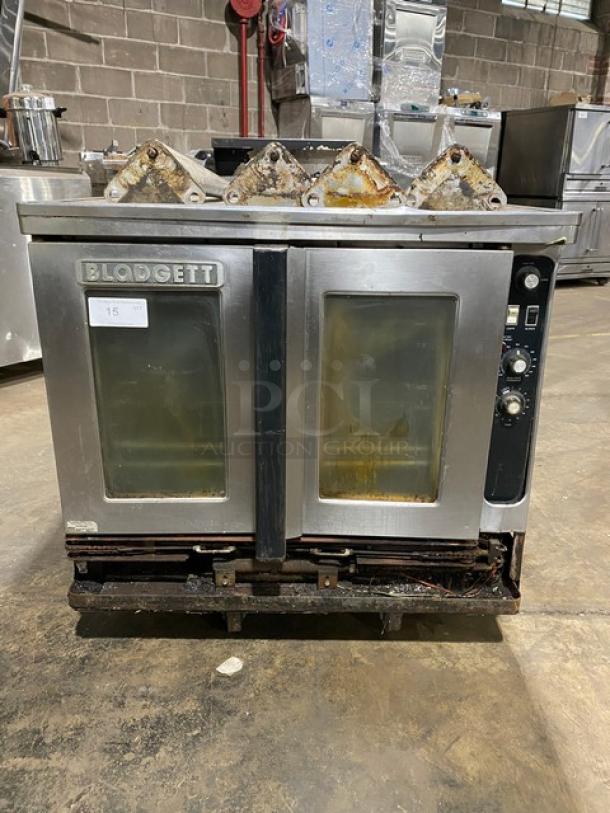 Blodgett commercial stainless steel gas convection oven, single stack. Features solid state thermostat, wired rack, legs.