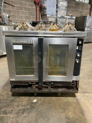 Blodgett commercial stainless steel gas convection oven, single stack. Features solid state thermostat, wired rack, legs.