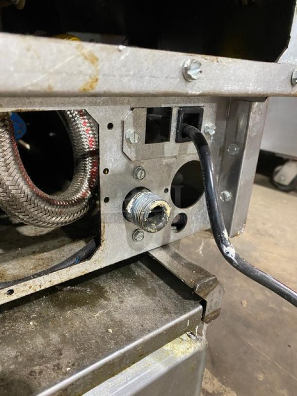 Pitco SFSG14-JS commercial deep fat fryer, stainless steel, natural gas, 40 lb capacity, filtration system, on casters.