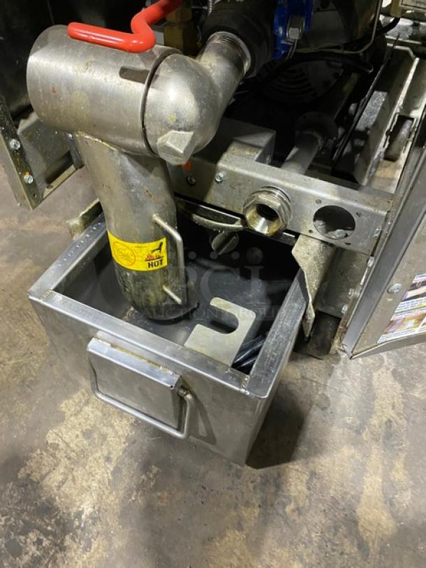 Pitco SFSG14JS 40 lb. stainless steel deep fat fryer with filtration system, natural gas-powered, on casters, model view.