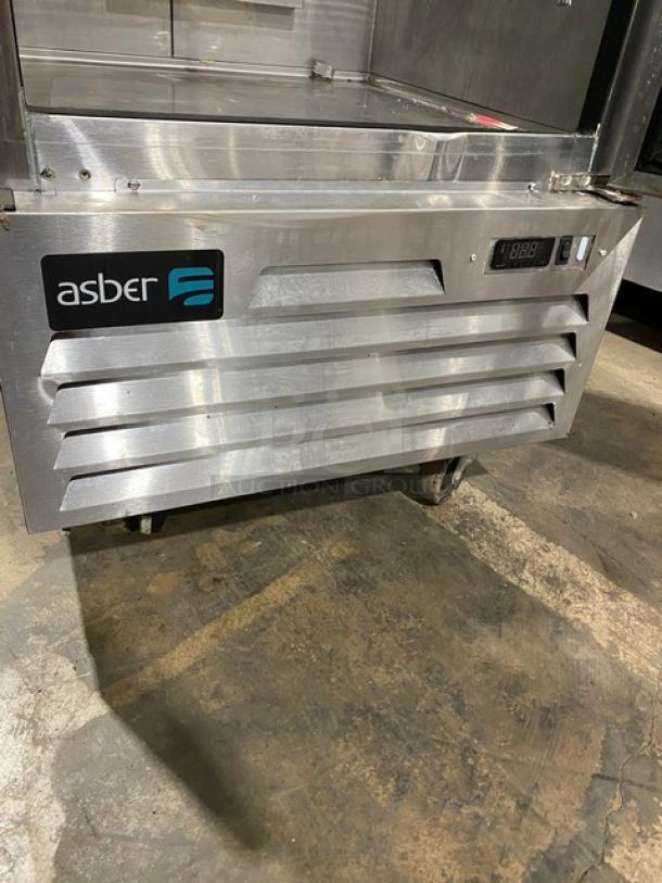 Commercial Asber 2021 model ARF17FHC single door stainless steel reach-in freezer on casters with digital display.