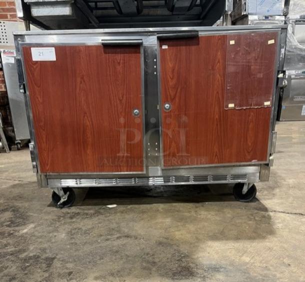Beverage-Air UCR48A 2-door stainless steel undercounter refrigerator with poly-coated racks, 115V, on casters, wood finish.
