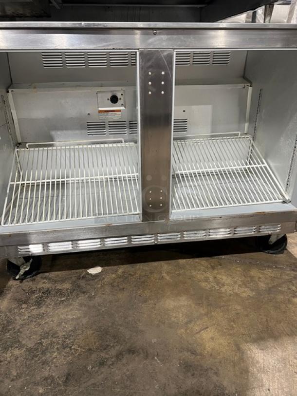 Beverage-Air UCR48A stainless steel 2-door undercounter refrigerator, poly-coated rack, 115V, 1 phase, on casters.