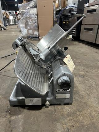 Hobart 1612E commercial deli meat slicer, electric-powered, countertop model, stainless steel, well-maintained condition, 220/240V.