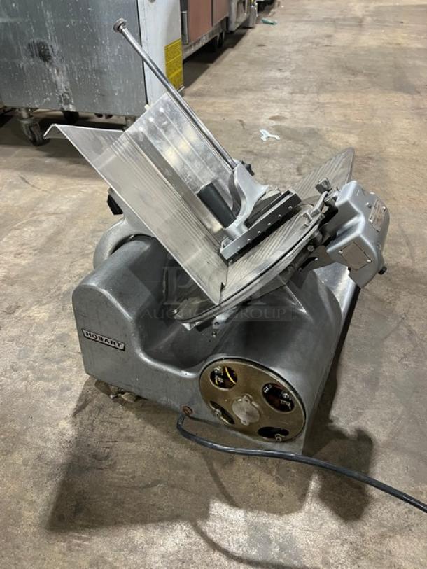 Hobart 1612E commercial deli meat slicer, countertop model, electric, 220/240V, good condition, visible logo.